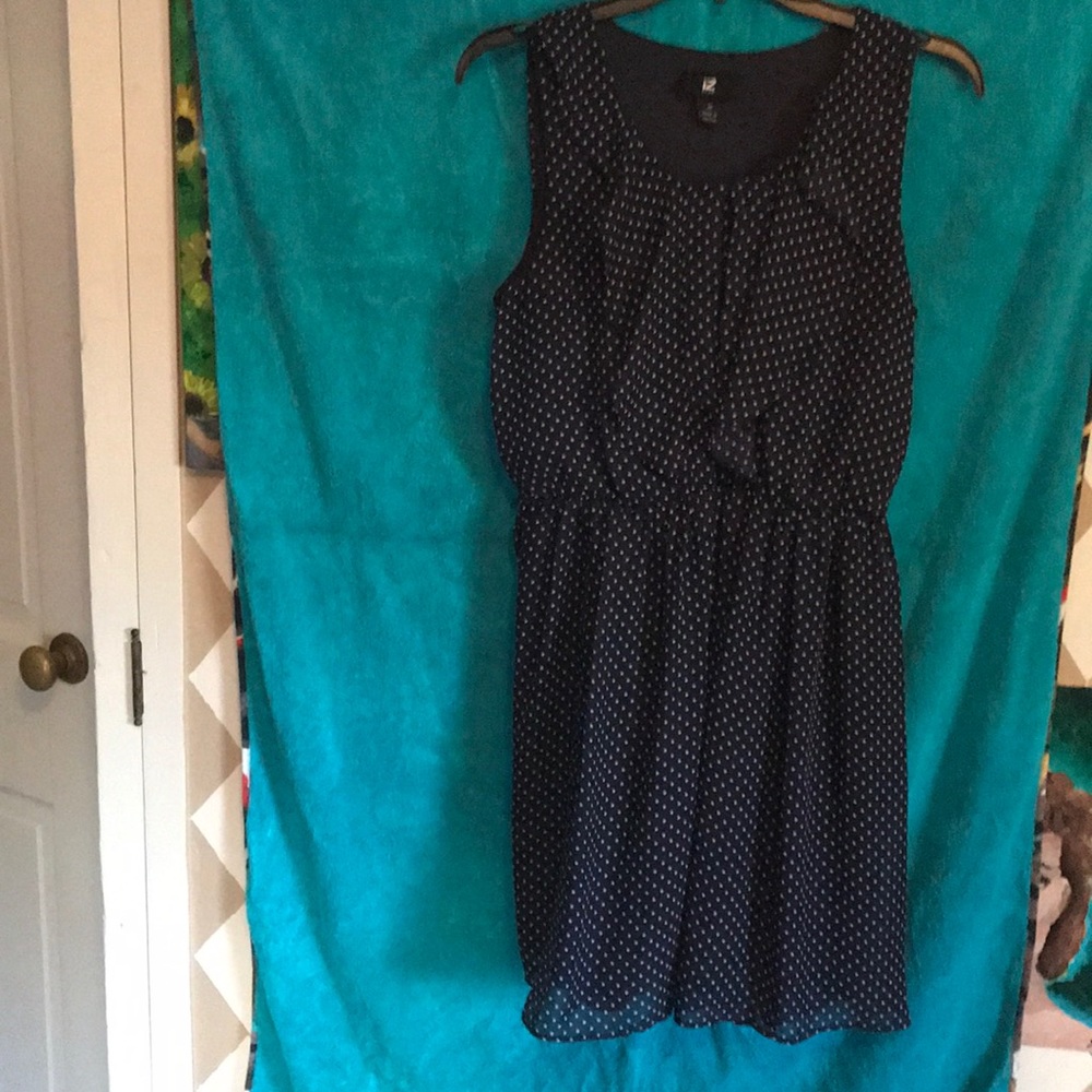 Navy polka dot dress with ruffles